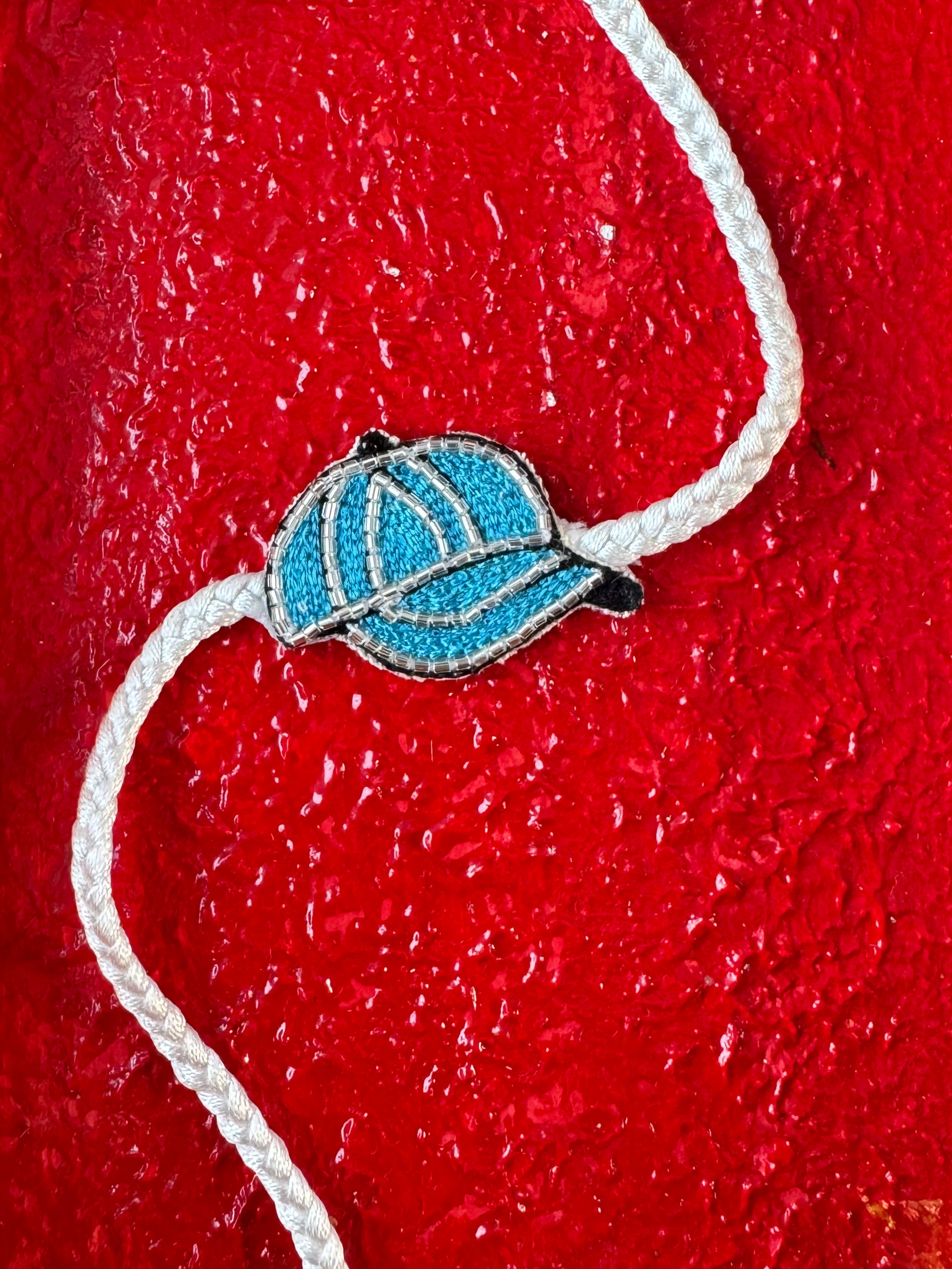 Blue Cap Charm Handmade Rakhi