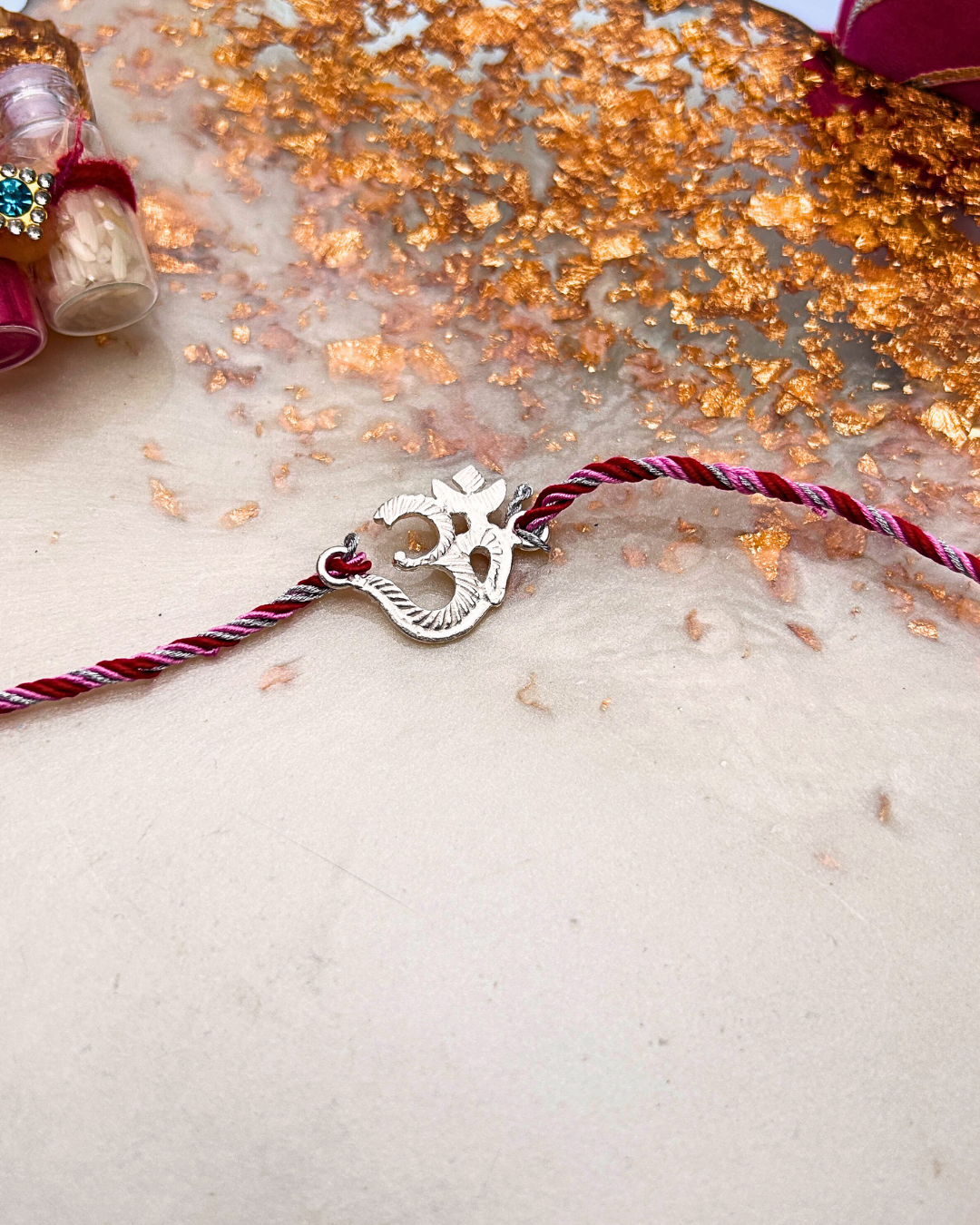 Silver "Om" Rakhi
