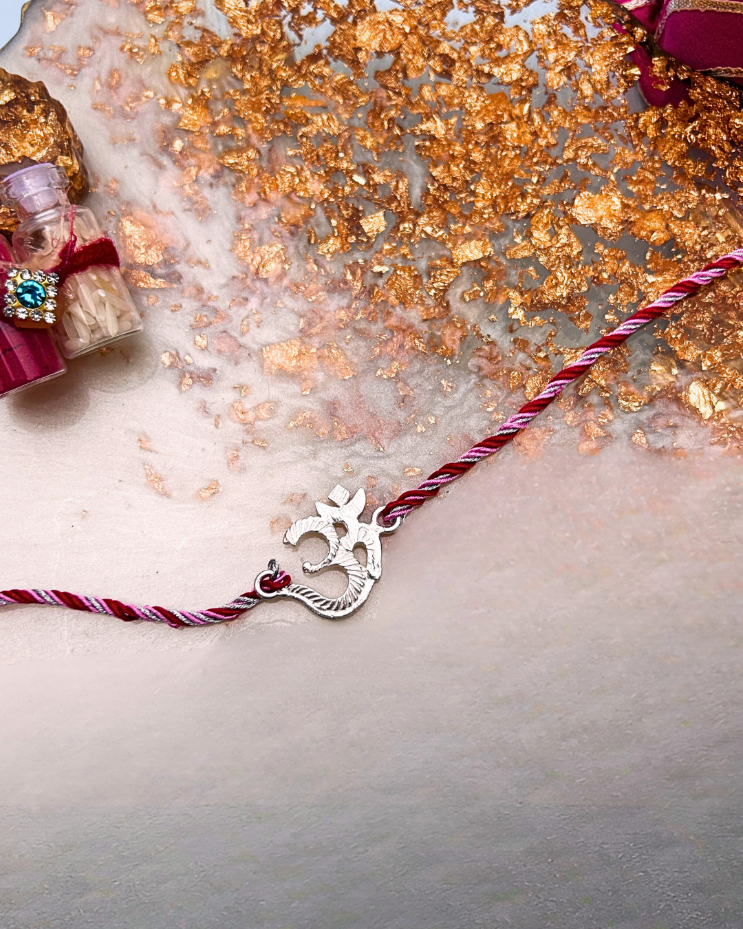 Silver "Om" Rakhi